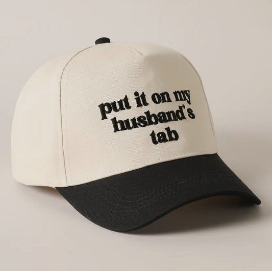 Put It On My Husbands Tab Trucker Hat