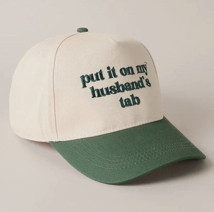 Put It On My Husbands Tab Trucker Hat